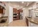 Kitchen with stainless steel appliances and granite countertops at 4318 N 180Th Dr, Goodyear, AZ 85395