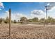 Sand volleyball court with a net and surrounding landscape, ideal for outdoor sports and recreation at 4453 S Huachuca Way, Chandler, AZ 85249