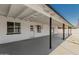Covered patio extends from the home with a large door and window for additional light at 4613 N 53Rd Dr, Phoenix, AZ 85031