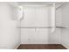 Walk-in closet with built-in shelving and ample storage space at 513 S 115Th Dr, Avondale, AZ 85323