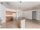 Kitchen with oak cabinets, granite countertops, and a convenient island for food preparation and serving at 513 S 115Th Dr, Avondale, AZ 85323