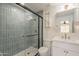 Updated bathroom features a tiled shower, modern vanity, and brass accents at 5132 N 83Rd St, Scottsdale, AZ 85250