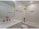 This bright bathroom offers new fixtures and a shower over tub combination at 5132 N 83Rd St, Scottsdale, AZ 85250