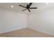 This bedroom features a ceiling fan, wood floors and neutral paint at 5132 N 83Rd St, Scottsdale, AZ 85250