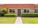 Charming home exterior with a red tile roof, well-maintained landscaping, and a secure front door at 5132 N 83Rd St, Scottsdale, AZ 85250
