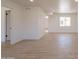 Bright and airy living room featuring wood-look floors and neutral paint, creating a welcoming space at 5132 N 83Rd St, Scottsdale, AZ 85250