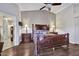 Spacious bedroom featuring a wood bed frame and neutral walls at 5144 W Sweetwater Ave, Glendale, AZ 85304