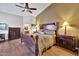 Bedroom showcasing beautiful furniture, wood floors and a ceiling fan at 5144 W Sweetwater Ave, Glendale, AZ 85304