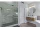 Modern bathroom featuring glass-enclosed shower, sleek vanity, and contemporary design at 6449 E Paradise Ln, Scottsdale, AZ 85254