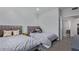 Comfortable bedroom with two beds, soft lighting, and modern design at 6449 E Paradise Ln, Scottsdale, AZ 85254