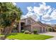 Charming two-story home with a well-maintained lawn and mature landscaping at 6449 E Paradise Ln, Scottsdale, AZ 85254