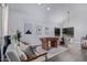 Bright living room with foosball table and modern decor and dining table at 6449 E Paradise Ln, Scottsdale, AZ 85254