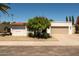 Charming single-story home featuring a well-manicured front yard and a two-car garage at 7618 N Via Del Paraiso --, Scottsdale, AZ 85258