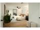Comfortable main bedroom with a decorative headboard, ceiling fan, and neutral decor at 7618 N Via Del Paraiso --, Scottsdale, AZ 85258
