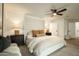 A serene main bedroom with a neutral palette, plush textiles, and a ceiling fan at 7618 N Via Del Paraiso --, Scottsdale, AZ 85258