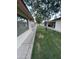 Lush backyard featuring green grass and mature trees creating a serene outdoor space at 8255 E Kiva Ave # 430, Mesa, AZ 85209