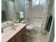 Bathroom with vanity, toilet, shower and bright window at 8255 E Kiva Ave # 430, Mesa, AZ 85209
