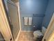 Shower and toilet in renovated bathroom with neutral colors and tile floors at 8255 E Kiva Ave # 430, Mesa, AZ 85209