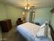 Well-lit bedroom with carpet floors and ceiling fan, perfect for relaxation at 8255 E Kiva Ave # 430, Mesa, AZ 85209