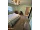 Bedroom showcasing soft natural light, carpet, and ensuite bathroom at 8255 E Kiva Ave # 430, Mesa, AZ 85209