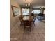 Inviting dining room with seating for six with an attached view into the living room and natural light at 8255 E Kiva Ave # 430, Mesa, AZ 85209