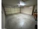 Large garage with ample storage space, built-in cabinets, and room for multiple vehicles at 8255 E Kiva Ave # 430, Mesa, AZ 85209