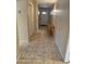 Inviting hallway with tile flooring leading to the front entrance at 8255 E Kiva Ave # 430, Mesa, AZ 85209