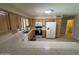 Functional kitchen with classic cabinets, white appliances, and a large counter with tile flooring at 8255 E Kiva Ave # 430, Mesa, AZ 85209