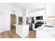 Contemporary kitchen featuring stainless steel appliances, quartz countertops, an island, and recessed lighting at 8343 W Audrey Ln, Peoria, AZ 85382