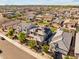Birds eye view of a neighborhood featuring neatly landscaped houses with tile roofs at 8754 W San Juan Ave, Glendale, AZ 85305