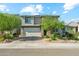 Beautiful two-story home with a two car garage and well maintained front yard landscaping at 8754 W San Juan Ave, Glendale, AZ 85305
