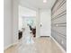 Bright foyer with ceramic tile flooring, decorative wall trim and views into the front office at 8754 W San Juan Ave, Glendale, AZ 85305