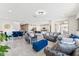 Open-concept living space with kitchen and dining area; great for entertaining Gathering and friends at 8754 W San Juan Ave, Glendale, AZ 85305