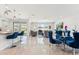 Spacious and sunny open concept living space with sleek modern decor and stylish furnishings at 8754 W San Juan Ave, Glendale, AZ 85305