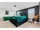 The main bedroom features a green bedspread, accent wall, and side table at 8754 W San Juan Ave, Glendale, AZ 85305