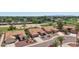 Aerial view shows the homes located in a golf course community at 9263 W Oraibi Dr, Peoria, AZ 85382