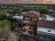 Expansive aerial view of this desert home reveals a spacious patio and tile roof at 9270 E Thompson Peak Pkwy # 347, Scottsdale, AZ 85255