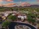 Panoramic aerial view showcasing the luxurious property with a golf course nearby at 9270 E Thompson Peak Pkwy # 347, Scottsdale, AZ 85255