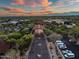 Overhead view of a tree lined entrance of a commerical business park at 9270 E Thompson Peak Pkwy # 347, Scottsdale, AZ 85255