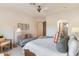 Relax in this bedroom offering comfortable seating, a king bed, ensuite and plenty of space at 9270 E Thompson Peak Pkwy # 347, Scottsdale, AZ 85255