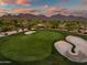 Lush golf course with manicured greens, sand traps, and scenic mountain backdrop at 9270 E Thompson Peak Pkwy # 347, Scottsdale, AZ 85255