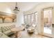 Bright sitting area with large windows, comfortable seating, and access to the exterior courtyard at 9270 E Thompson Peak Pkwy # 347, Scottsdale, AZ 85255