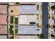 Aerial view of a community of single-Gathering homes each with unique yards and driveways at 9624 E Thunderbolt Ave, Mesa, AZ 85212