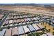 Bird's eye view of a community featuring houses of similar design and desert landscaping at 9624 E Thunderbolt Ave, Mesa, AZ 85212