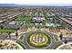 Aerial view featuring community amenities like a pool, clubhouse, and park, designed for leisure and community engagement at 9624 E Thunderbolt Ave, Mesa, AZ 85212