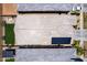 An aerial view highlighting the roof, solar panels, and yard of a single Gathering home at 9624 E Thunderbolt Ave, Mesa, AZ 85212