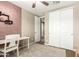 Bright bedroom featuring two-tone walls, a ceiling fan and a closet at 9624 E Thunderbolt Ave, Mesa, AZ 85212