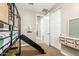 The room includes a bunk bed with a slide, storage and an accessible bathroom at 9624 E Thunderbolt Ave, Mesa, AZ 85212