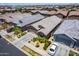 A single-Gathering home featuring desert landscaping, a driveway, and neutral exterior paint at 9624 E Thunderbolt Ave, Mesa, AZ 85212