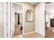 Hallway leading to bedroom with a black slide with access to the bathroom and closet at 9624 E Thunderbolt Ave, Mesa, AZ 85212
